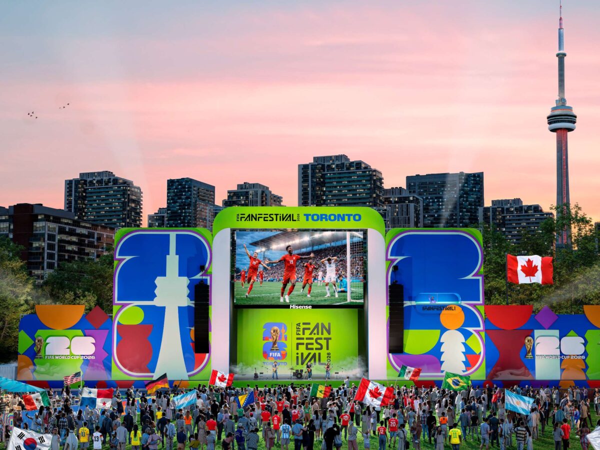 Fans enjoy a football match in Toronto.